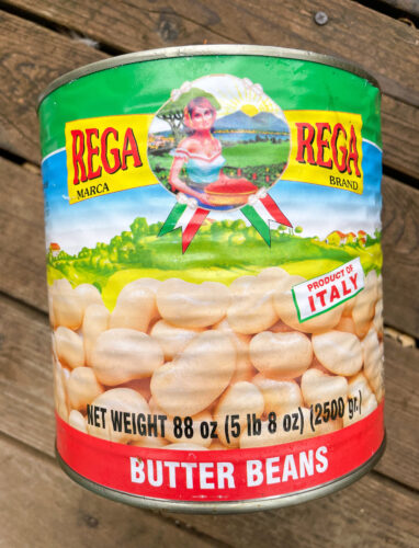 A large can of Rega brand butter beans.